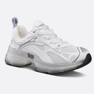Dior vibes sneaker. The classic running shoe. Size 8.5 White with silver detail.